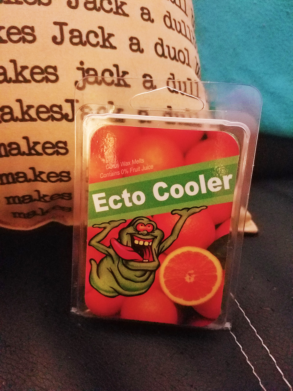 Ecto Cooler Wax Melts from HorrorDecor, featured here with their The Shining pillow.