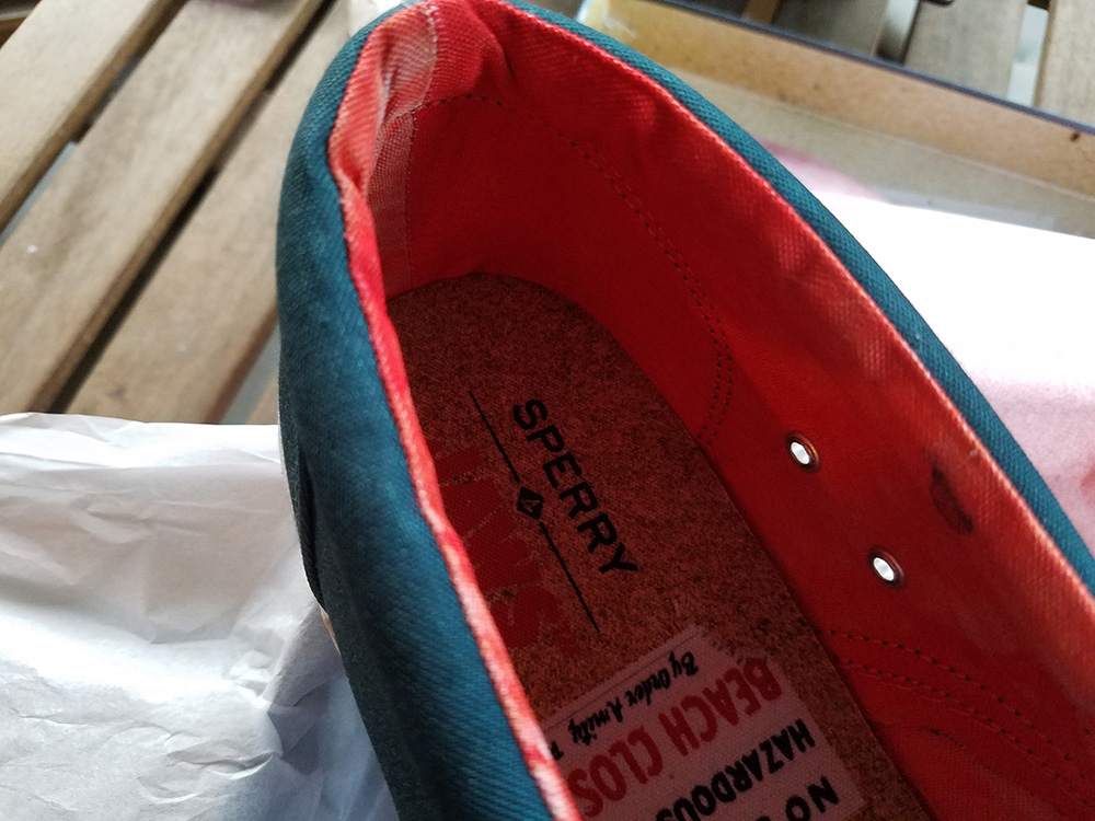 Bloody water detailing on the fabric inside the Sperry x Jaws Striper Slip On